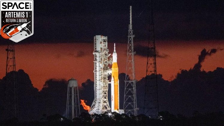 giant artemis 1 moon rocket on cloudy background at sunrise