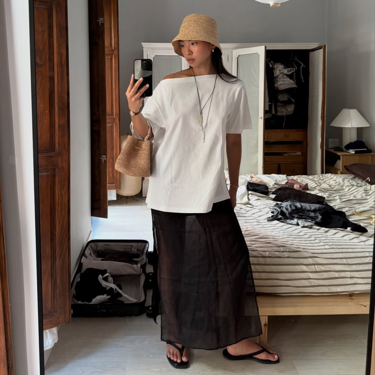 best linen skirts listing - black linen shirt, white T-shirt, straw hat