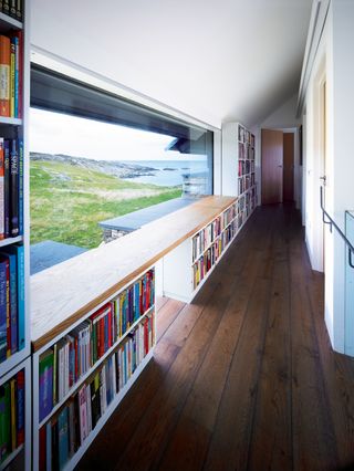 Landing idea with view and bookshelves