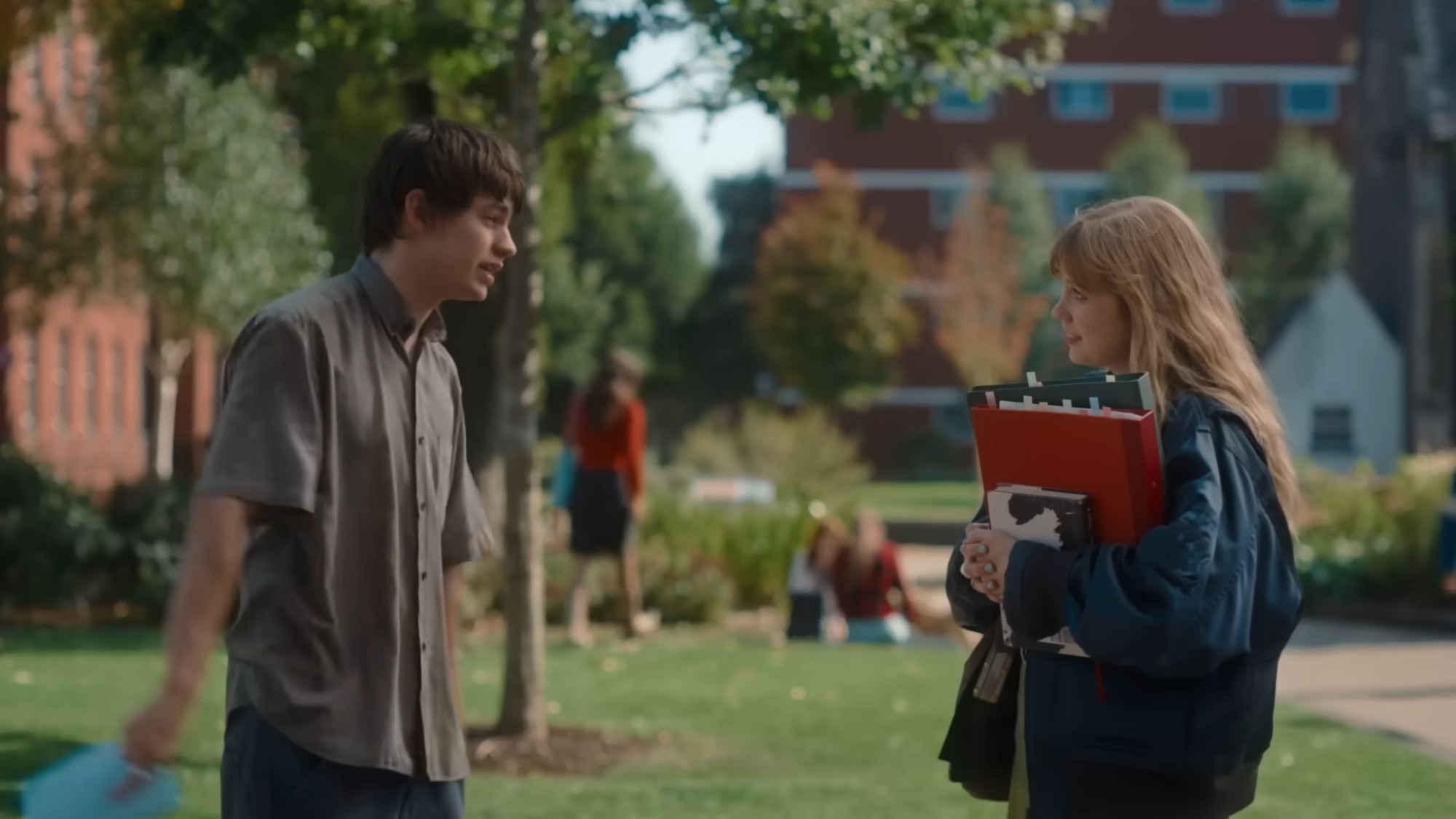 Angourie Rice with a book talking to Spike Fearn in Finding Emily.