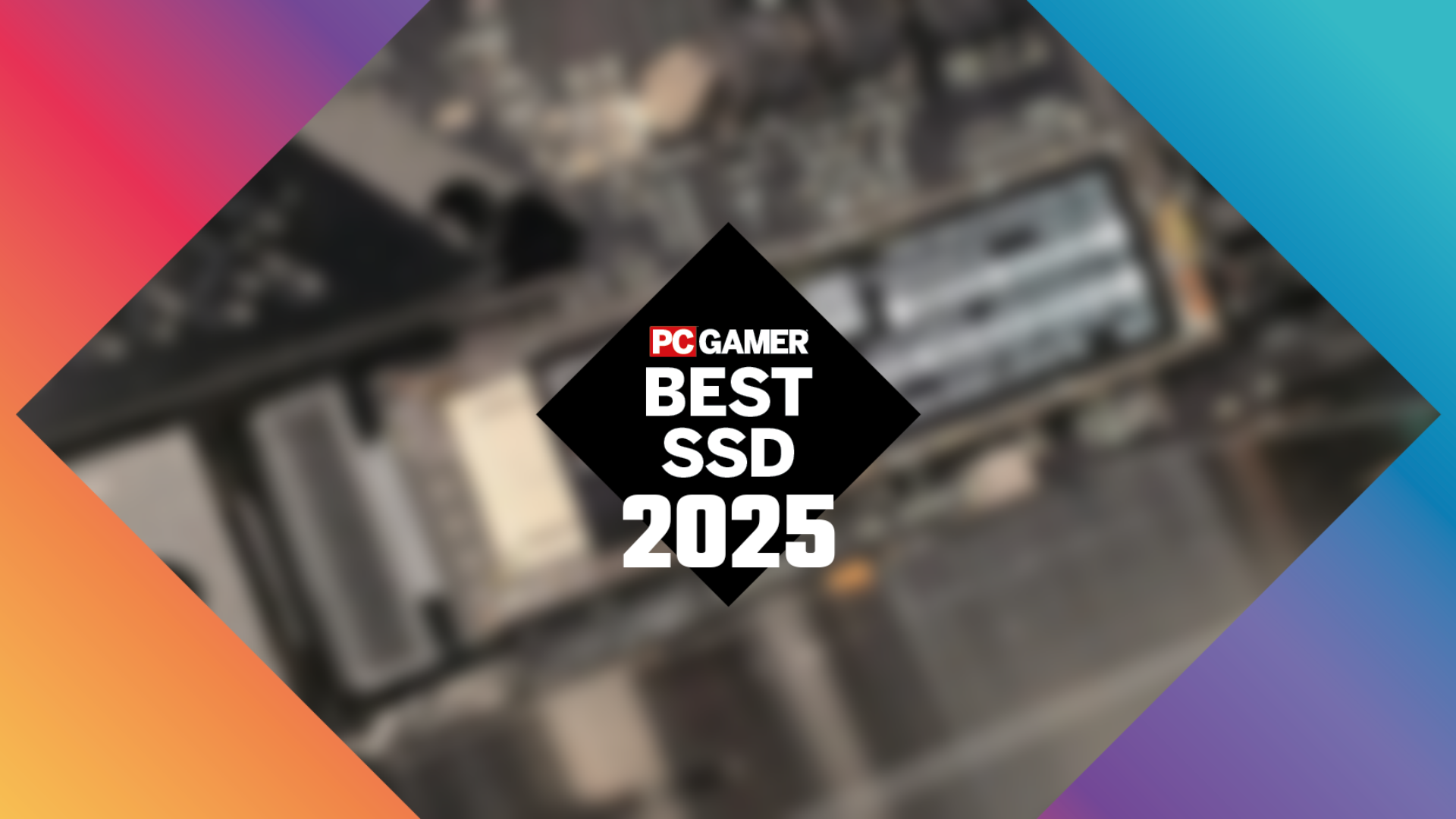 A black diamong hovers in the centre of the frame. White text overlaid on top reads 'PC Gamer Best SSD 2025'. In the background, a blurred out circuit board or similar computer hardware of some kind can be seen.