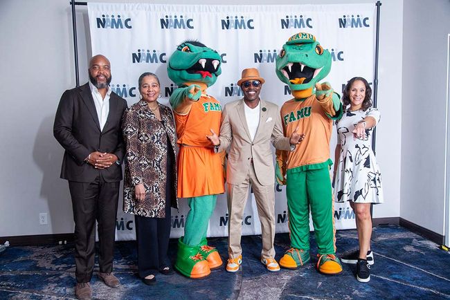 At the NAMIC Conference (from l.): Trymaine Lee, MSNBC correspondent and host of the &lsquo;Into America&rsquo; podcast; Shuanise Washington, president and CEO NAMIC; FAMU mascot &ldquo;Mrs. Venom;&rdquo; Will Packer, president and CEO, Will Packer Productionsl; FAMU mascot &ldquo;Mr. Venom;&rdquo; and Emory Walton, VP, content distribution, A+E Networks.