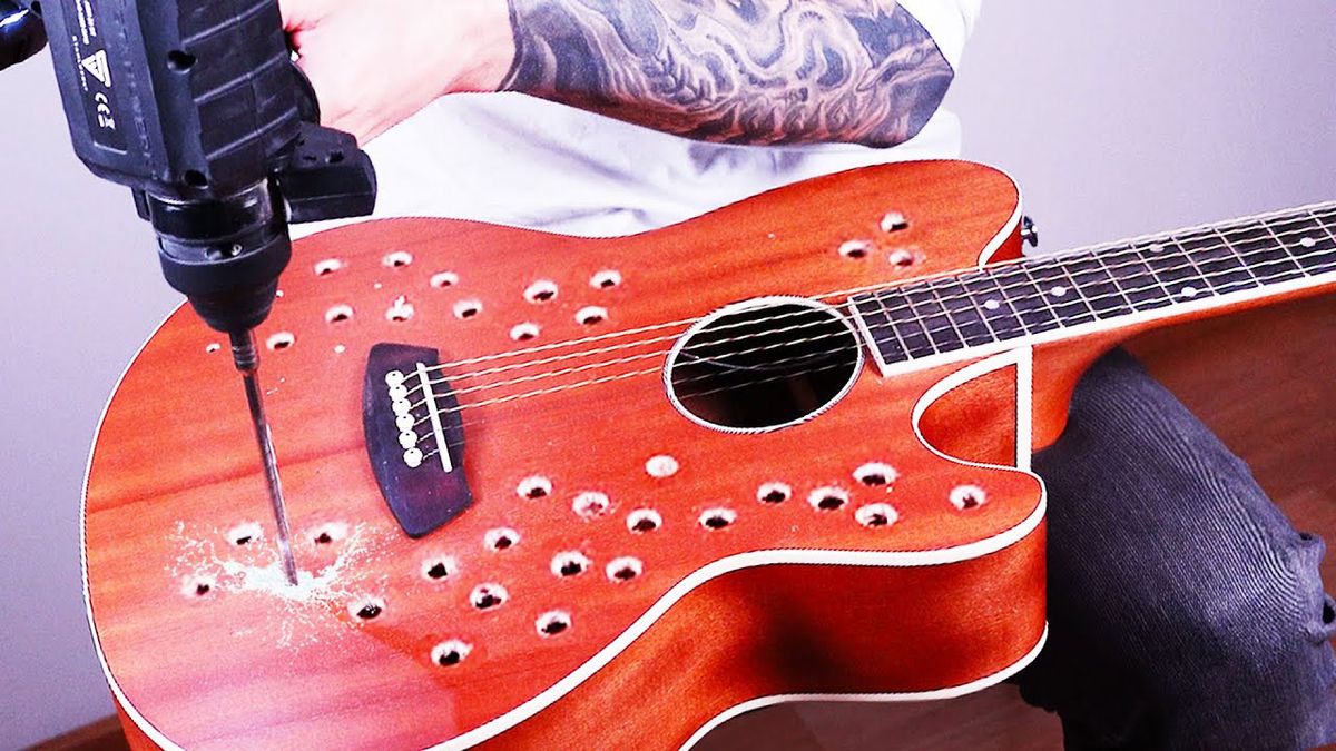 This is what an acoustic guitar sounds like after you've drilled dozens of holes in it