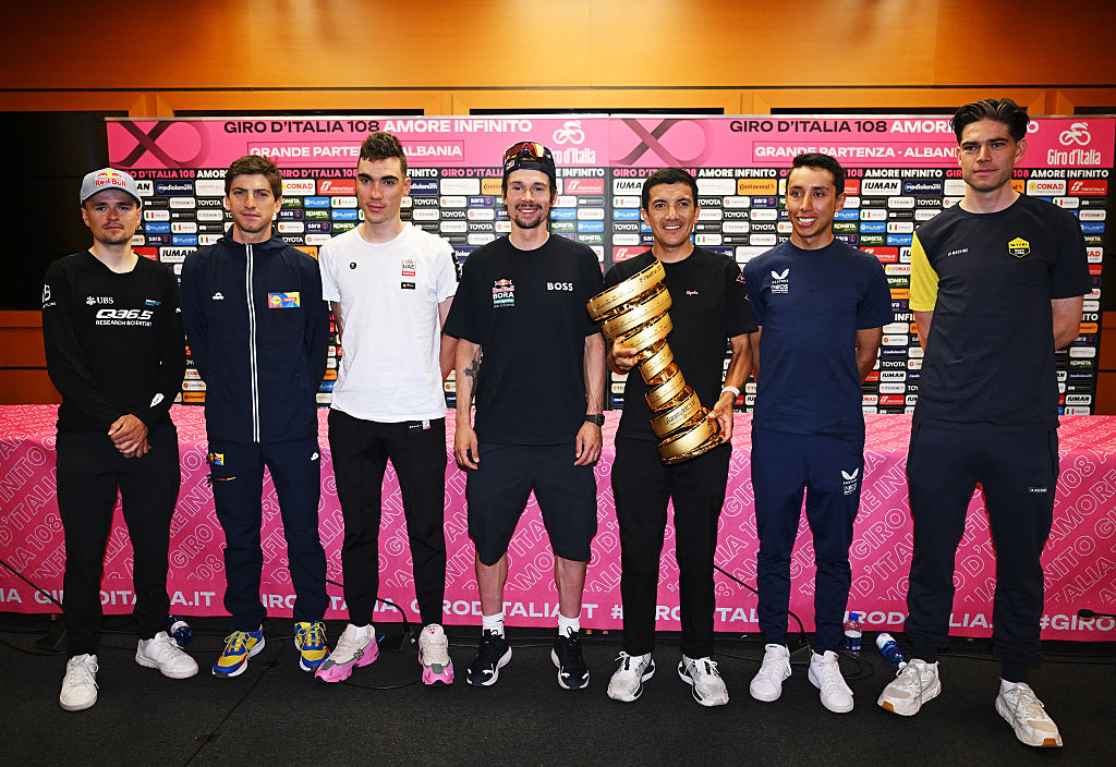 TIRANA ALBANIA MAY 08 LR Thomas Pidcock of Great Britain and Team Q365 Pro Cycling Giulio Ciccone of Italy and Team Lidl Trek Juan Ayuso of Spain and UAE Team Emirates XRG Primoz Roglic of Slovenia and Team Red Bull BORA hansgrohe Richard Carapaz of Ecuador and Team EF Education Easypost Egan Bernal of Colombia and Team INEOS Grenadiers an Wout Van Aert of Belgium and Team Visma Lease A Bike with Trofeo Senza Fine during the 108th Giro dItalia 2025 Top Riders Press Conference UCIWT on May 08 2025 in Tirana Albania Photo by Dario BelingheriGetty Images