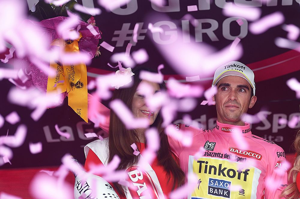 Alberto Contador (Tinkof-Saxo) showered in pink