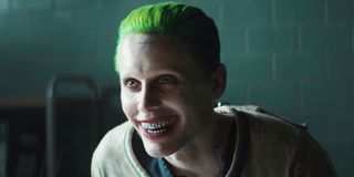 The Joker (Jared Leto) smiles in Arkham Asylum in Suicide Squad (2016)