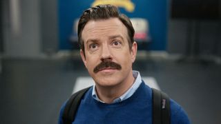 Ted Lasso standing in the AFC Richmond's men's locker room in Ted Lasso season 4