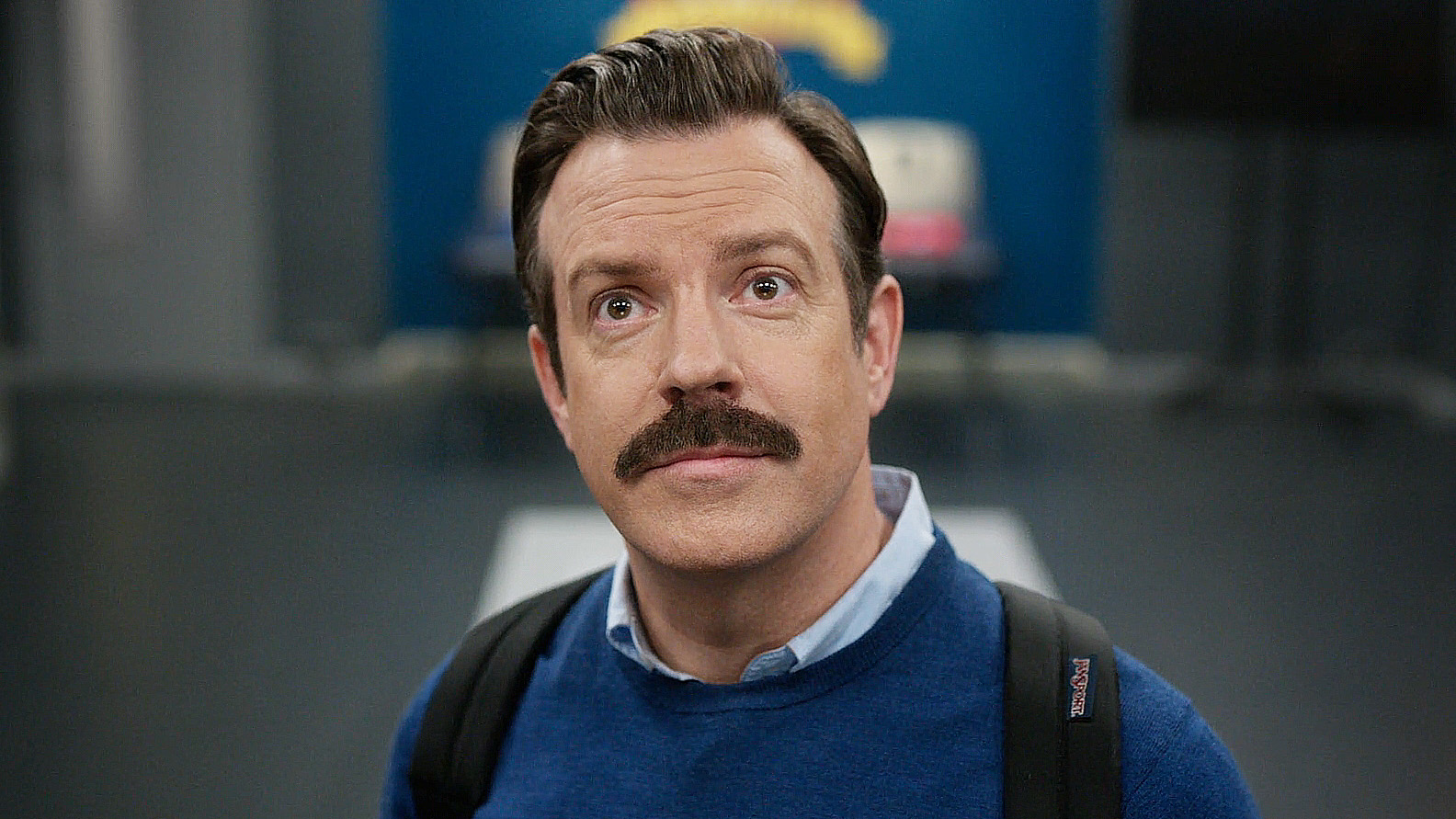 Ted Lasso standing in the AFC Richmond's men's locker room in Ted Lasso season 4