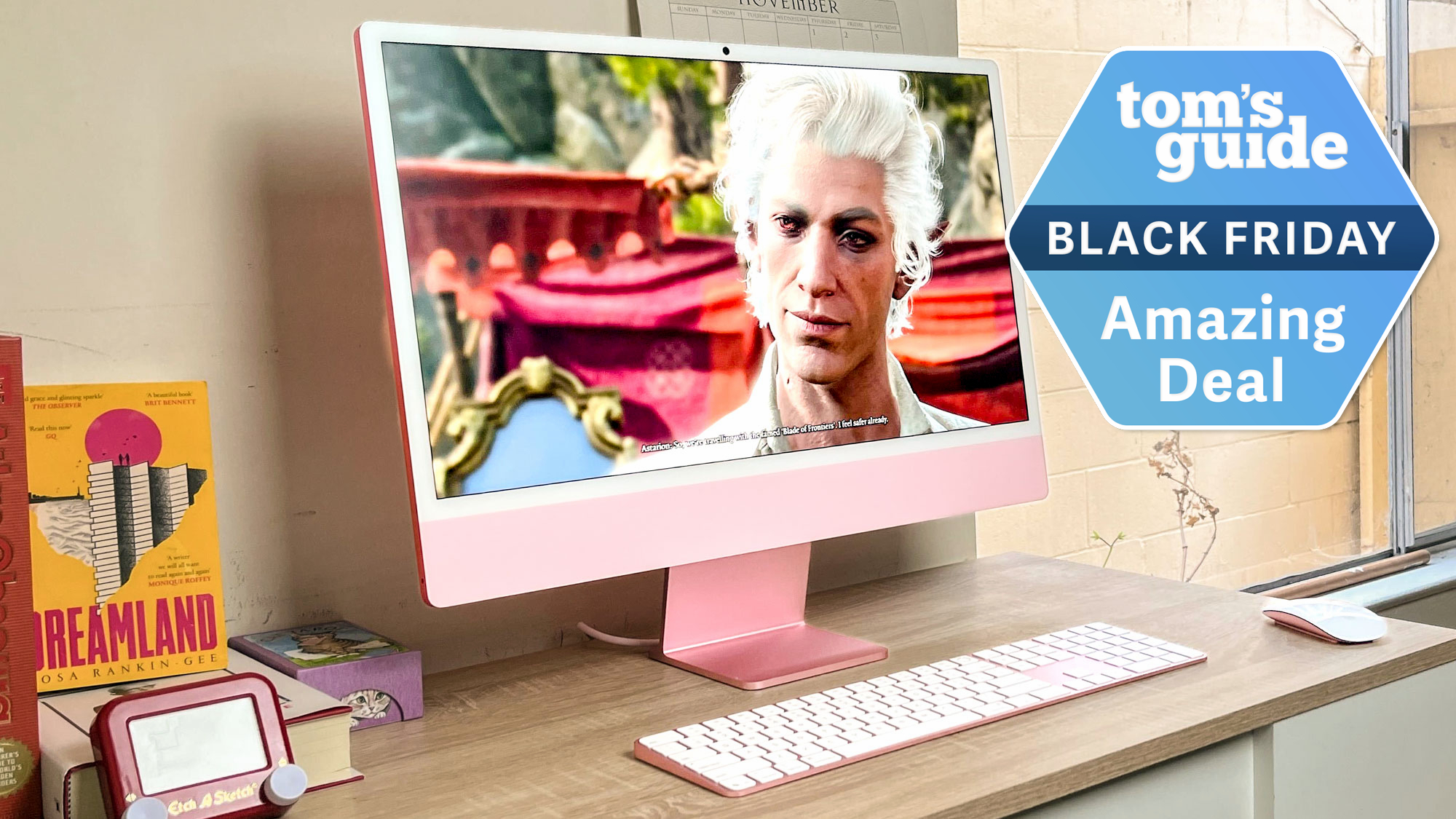 Apple iMac M4 on a desk with Black Friday tag superimposed