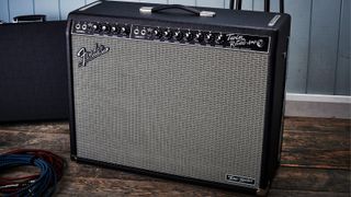 A Fender Twin Reverb amp on a wooden floor