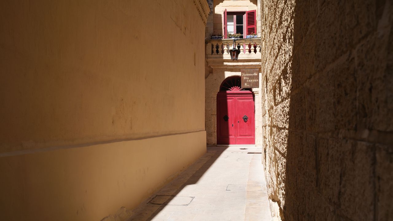 Fujifilm X100VI image gallery: ornate red door down an old alleyway in Valetta, Malta