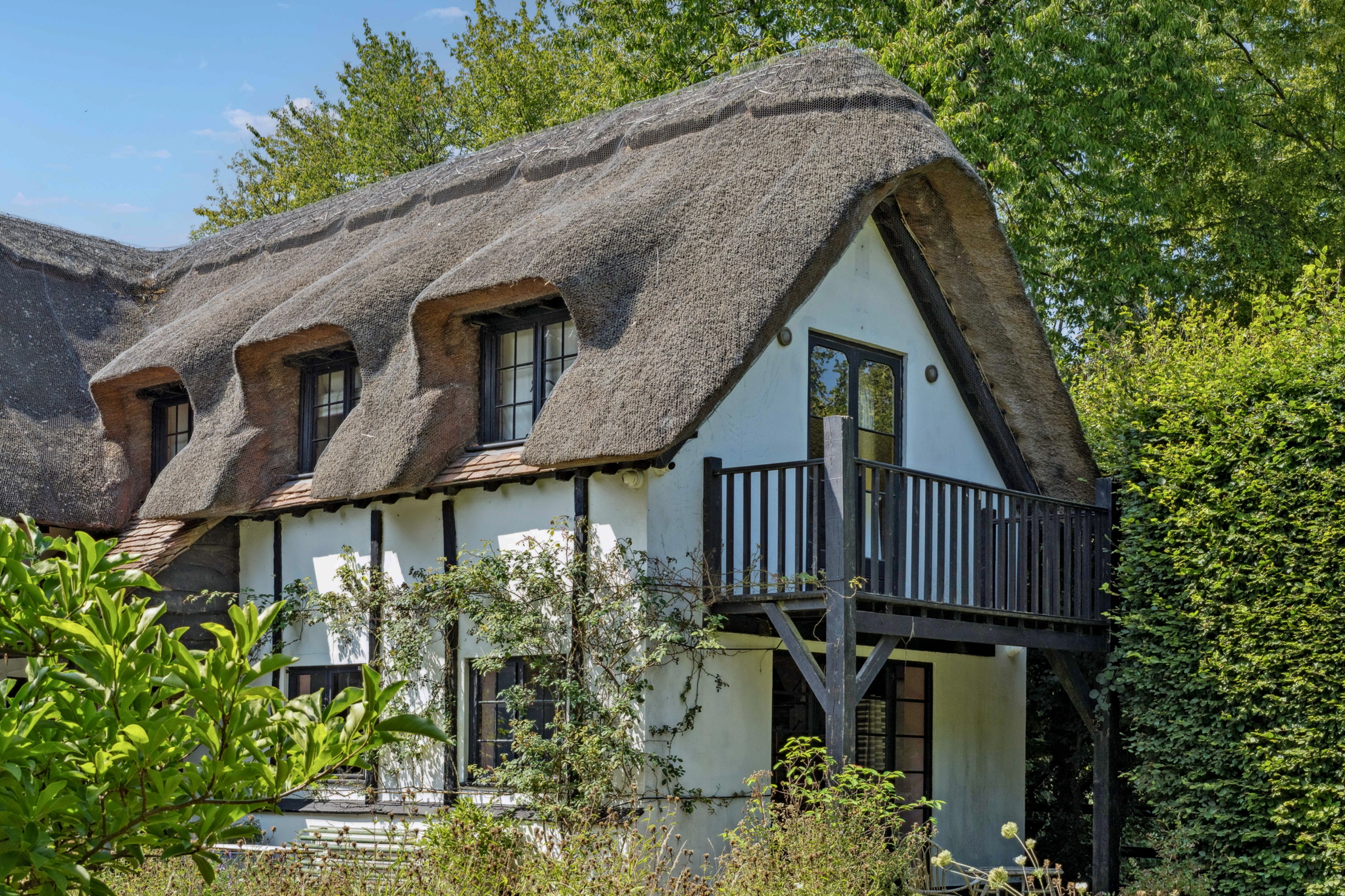 Images of Thatch, a house that looks a bit like Claudia Winkleman