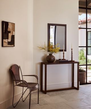modern organic entryway with console table and mirror