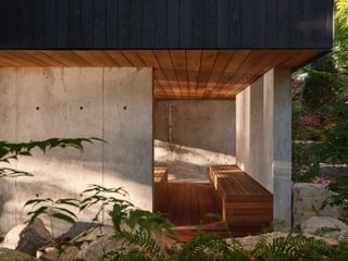 The outdoor Japanese-inspired hot tub in the lowest level