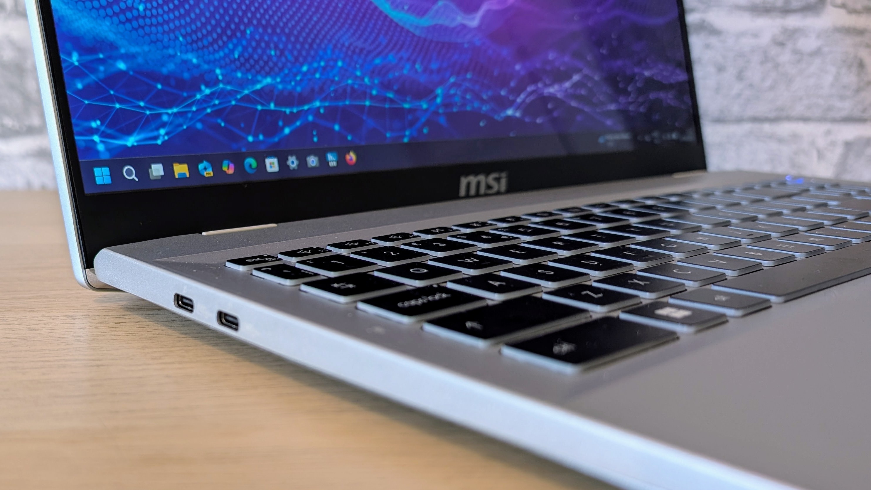 The MSI Prestige A16 AI+ on a desk