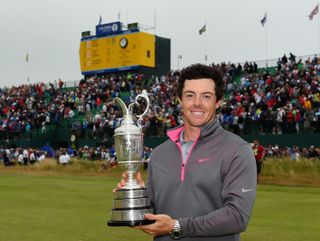 Rory McIlroy holds the Claret Jug in 2014