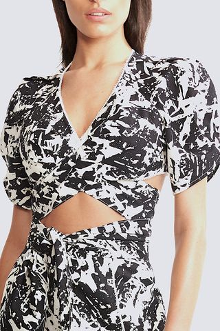 woman wearing patterned top