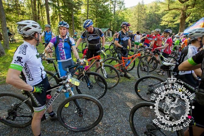 Riders chat while waiting for the start.