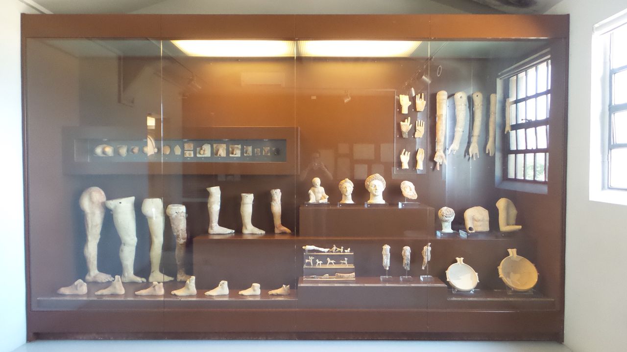 More votive offerings for the healing god Asclepius.