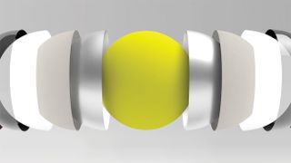 image of tennis ball between cup-like objects