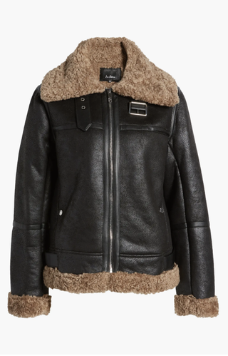 a shearling and leather nordstrom jacket on a plain backdrop