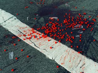 Cherries spilled on crosswalk, New York City