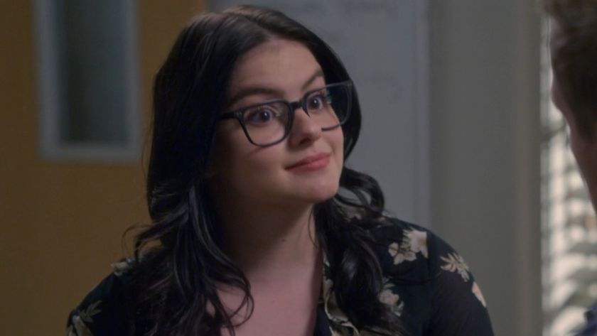 Ariel Winter almost smiling in an episode of Modern Family. 