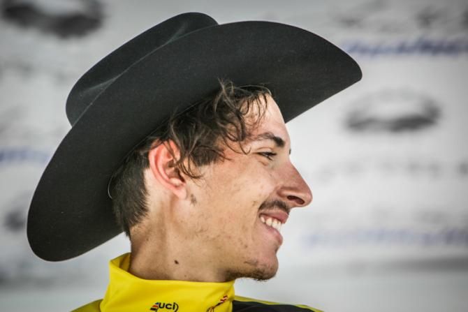 Lachlan Morton (Garmin-Sharp) gets his famed Utah cowboy hat after winning the stage.
