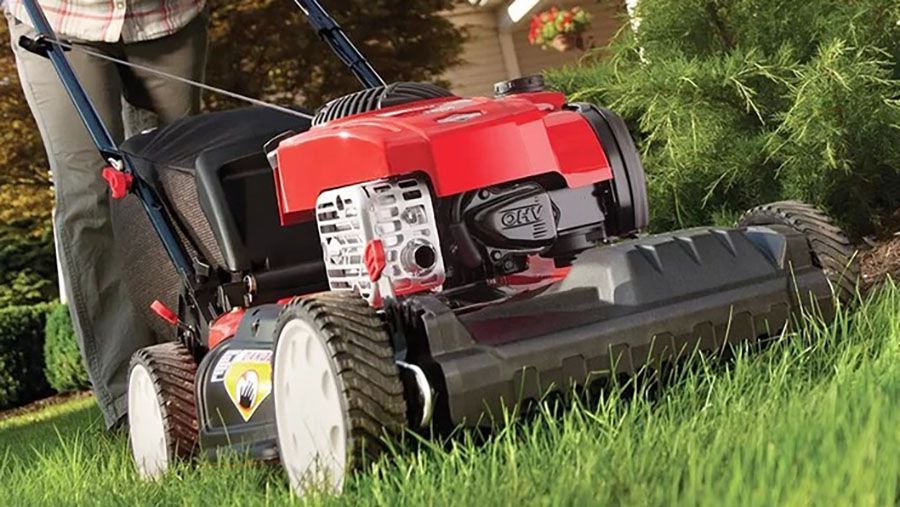 When should you stop mowing your lawn before winter?