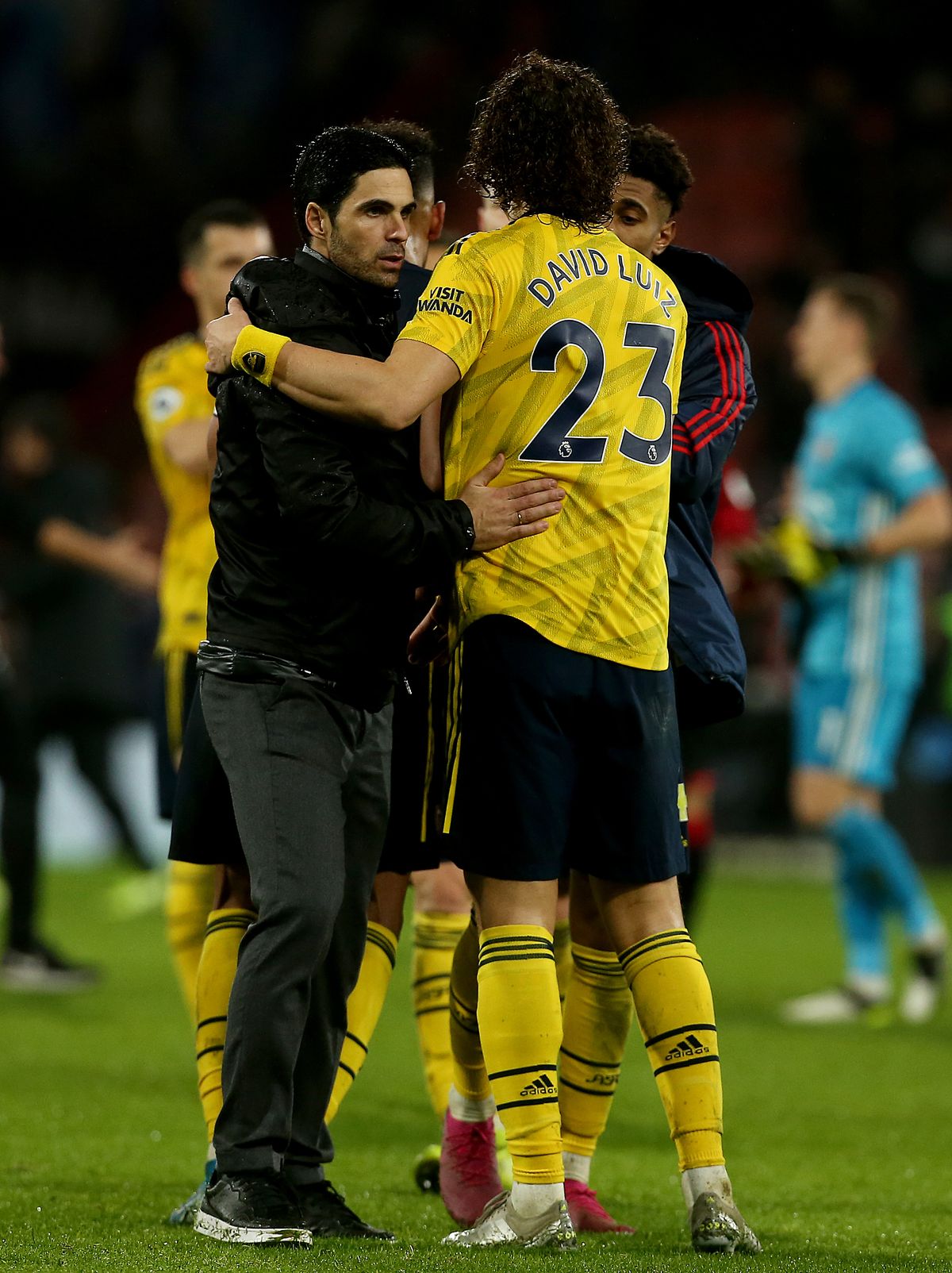 Arsenal’s manager Mikel Arteta (left) has said he wants to keep David Luiz (right) at the club.