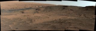 This image taken by the Curiosity rover's Mast Camera shows the "Pahrump Hills" outcrop and surrounding terrain, as seen from a position about 70 feet (20 meters) northwest of the outcrop.