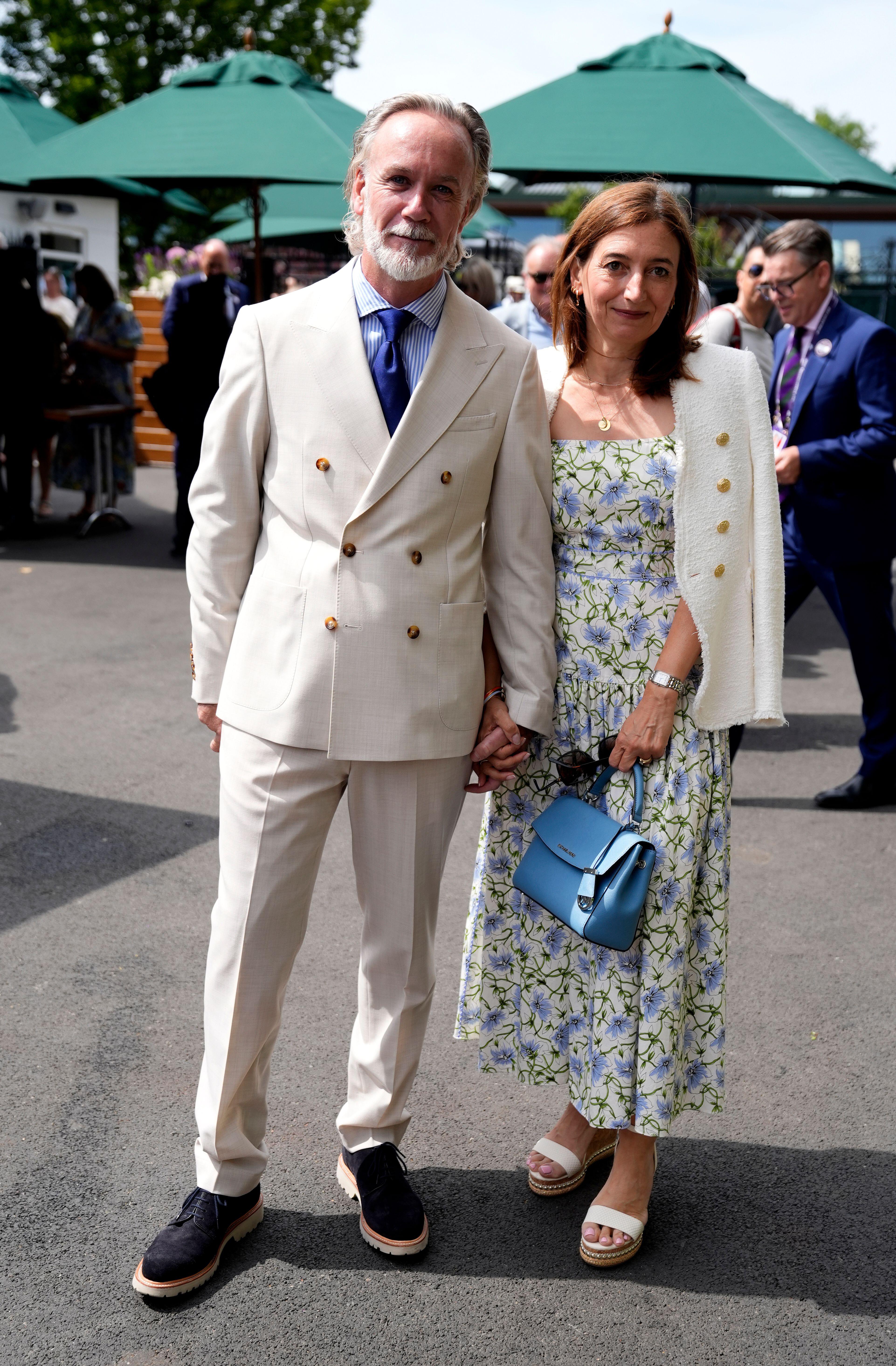 With wife Jane at Wimbledon last year.