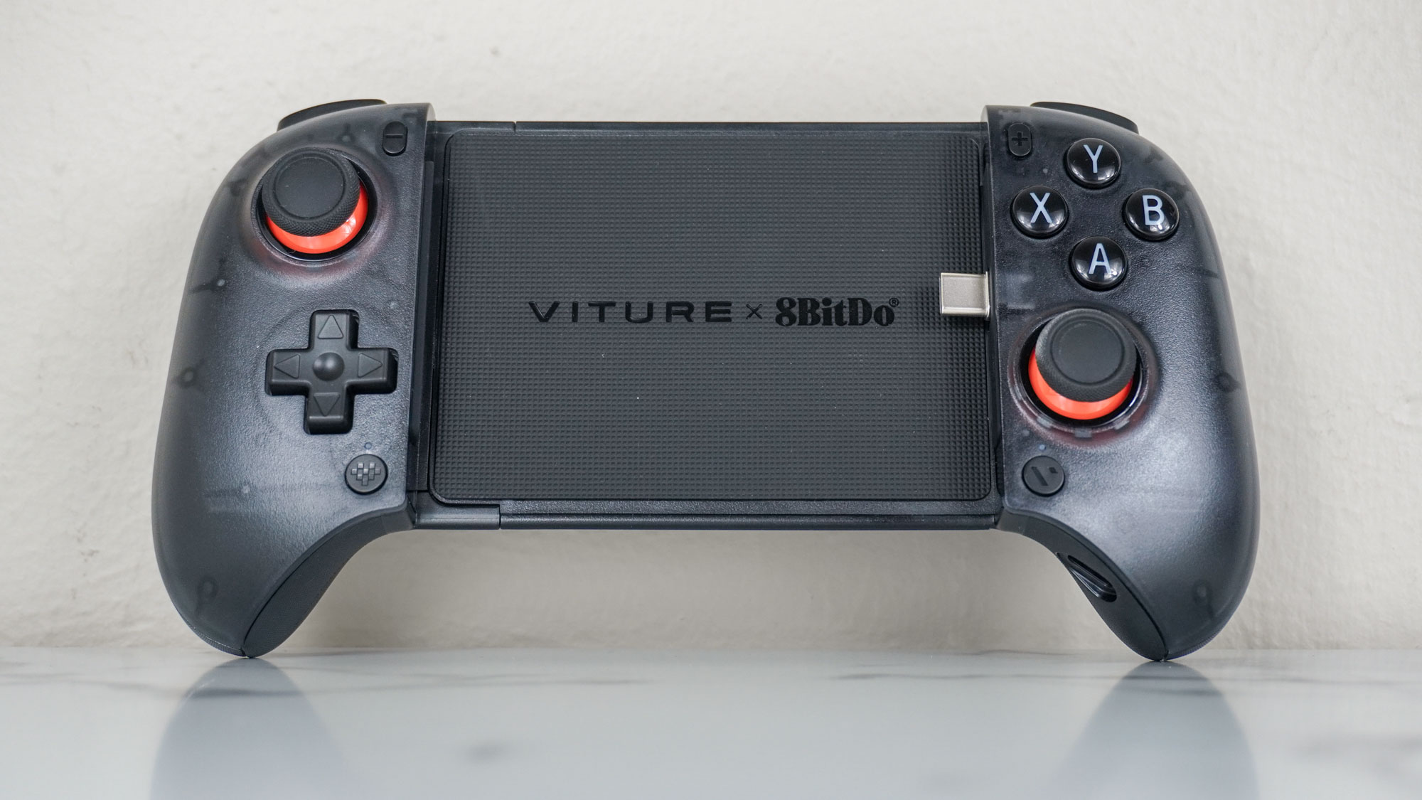 The Viture x 8BitDo Ultimate Mobile Gaming Controller on a desk