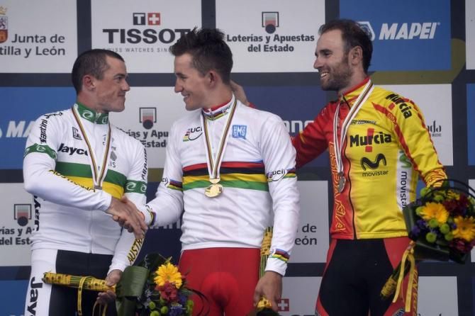Michal Kwiatkowski (Poland and Simon Gerrans (Australia) shake hands on the podium
