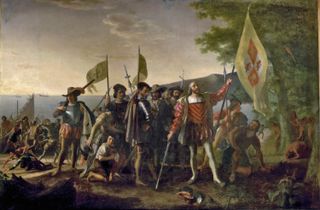 A painting shows Columbus landing in what he called the West Indies in 1492.