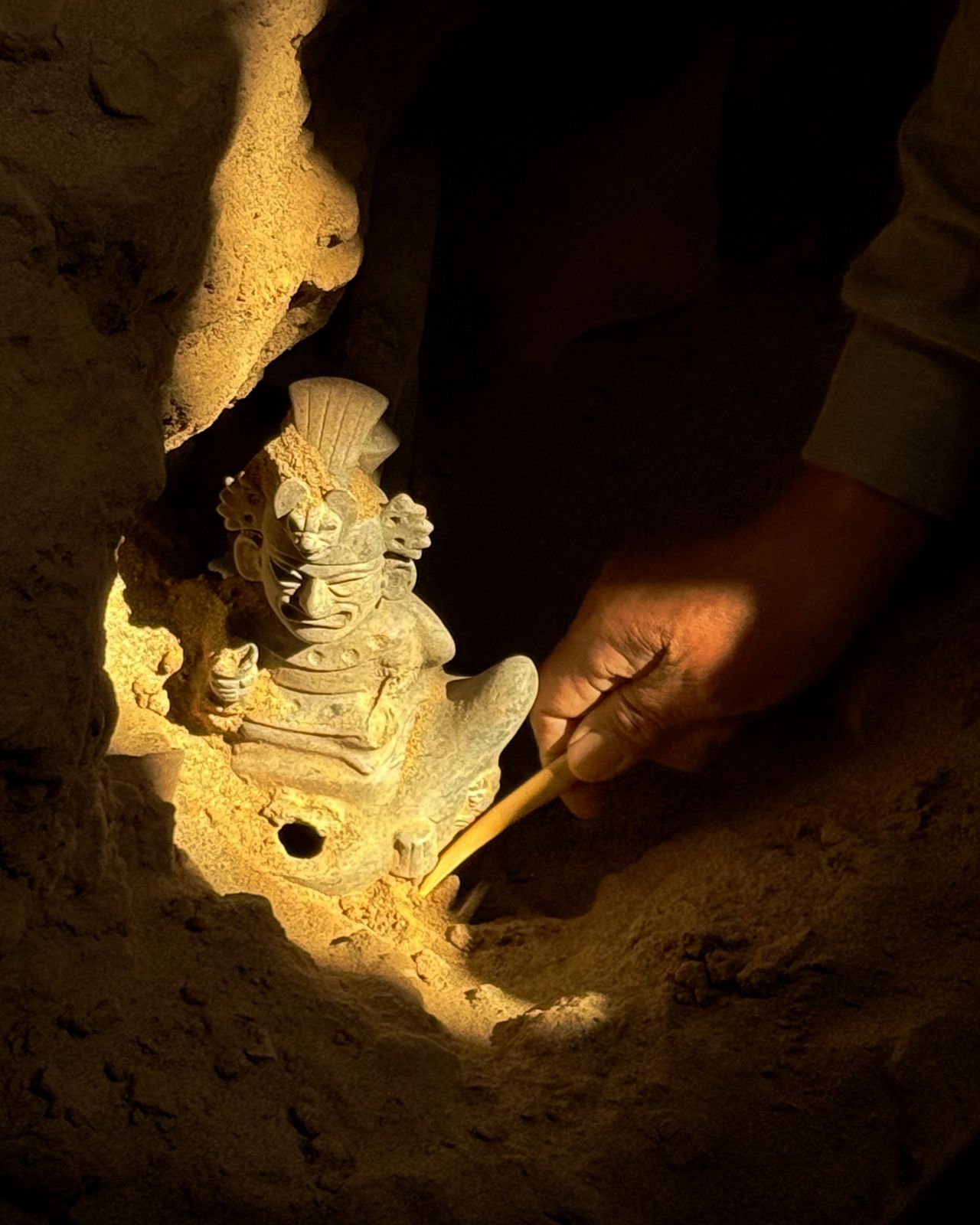 Scenes showing an excavation inside a cave