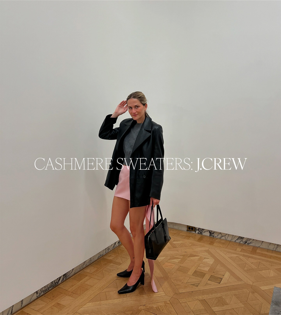 Eliza Huber wearing a J.Crew gray sweater with a leather blazer and pink skirt. Text reads: "Cashmere Sweaters: J.Crew."