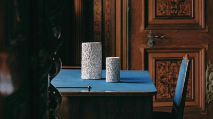 metal design displayed within a historic castle interior