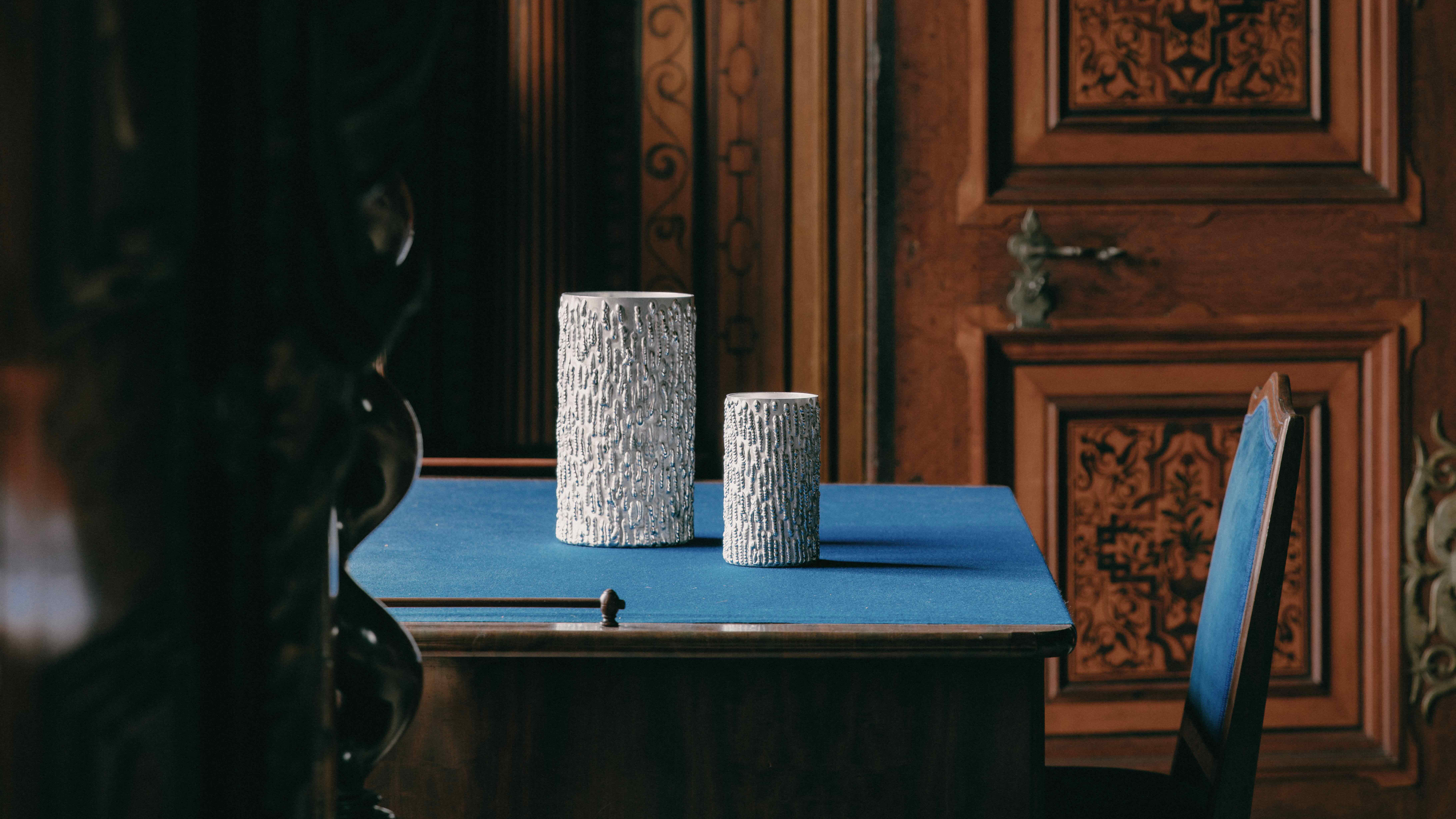 metal design displayed within a historic castle interior