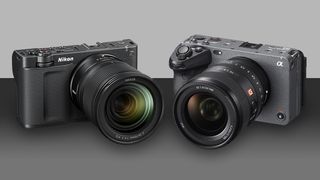 Nikon ZR next to a Sony FX3 on a grey background