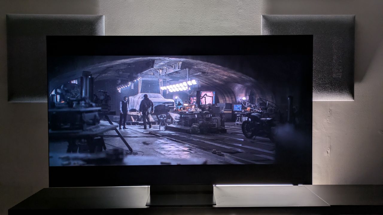 Samsung R95H with shot of Bruce and Alfred in the Batcave from The Batman. R95H shows strong contrast