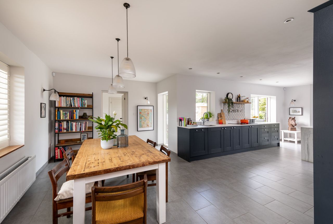 The newly opened-up kitchen/dining space is designed to be light and bright &mdash; the original home was dark and full of small rooms.