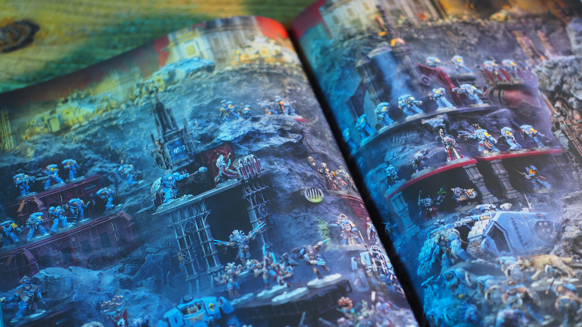A Space Wolves detachment shown in the Space Wolves Codex, lying on a wooden table