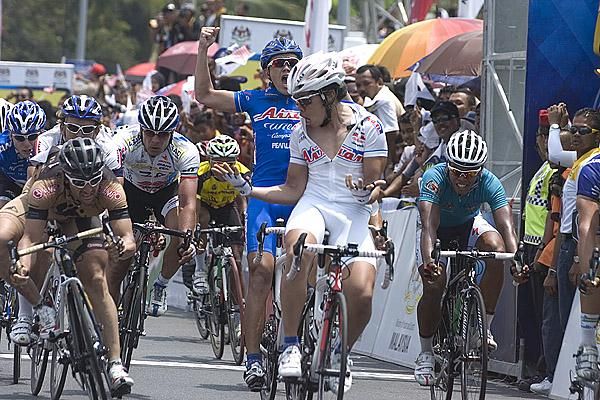 This one's mine baby: Japanese rider Taiji Nishitani (Aisan Racing Team) lets the others know who is the best on stage four.