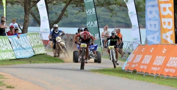 Burry Stander sprints to the win ahead of Kevin Evans