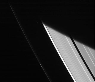 Atlas Emerges from Saturn's Shadow