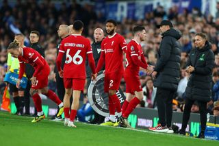  Trent Alexander-Arnold of Liverpool is replaced by Joe Gomez during the Premier League match between Everton FC and Liverpool FC at Goodison Park on April 24, 2024 in Liverpool, England. (Photo by Chris Brunskill/Fantasista/Getty Images)