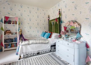 child's bedroom with four poster bed