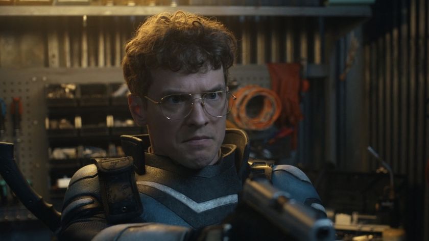 Alternate Vigilante holding a gun in his basement 
