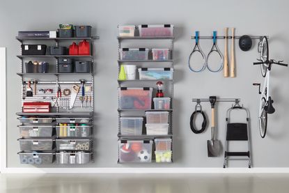 wall storage for various equipment and tools as an example of organizing a garage